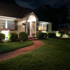 Beautiful house and yard at night